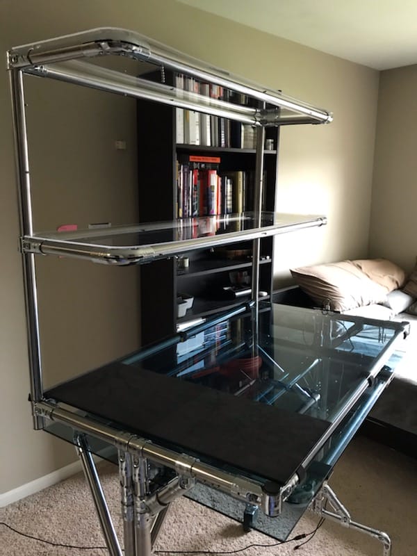 DIY standing desk made with pipes and fittings