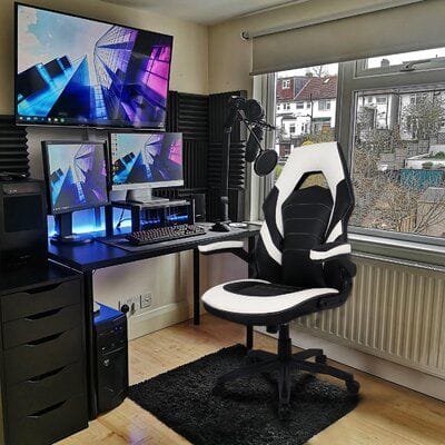 this image shows a multi monitor gaming station.